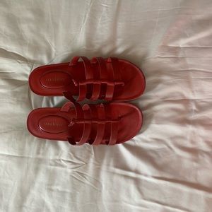 Red platform leather slides